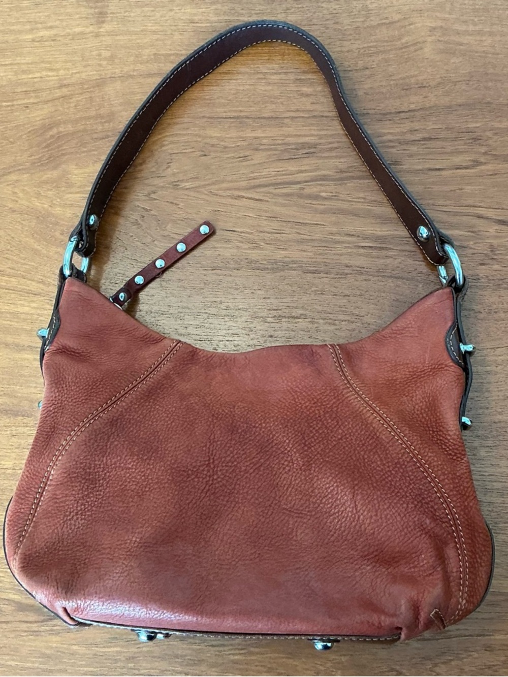Vintage Bosca Handbag in pebbled cognac leather with brown leather accents.
